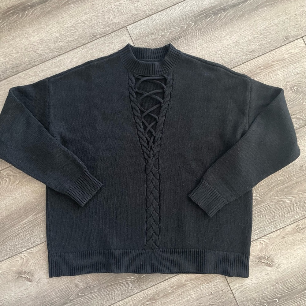 Kendall & Kylie black sweater with special details .